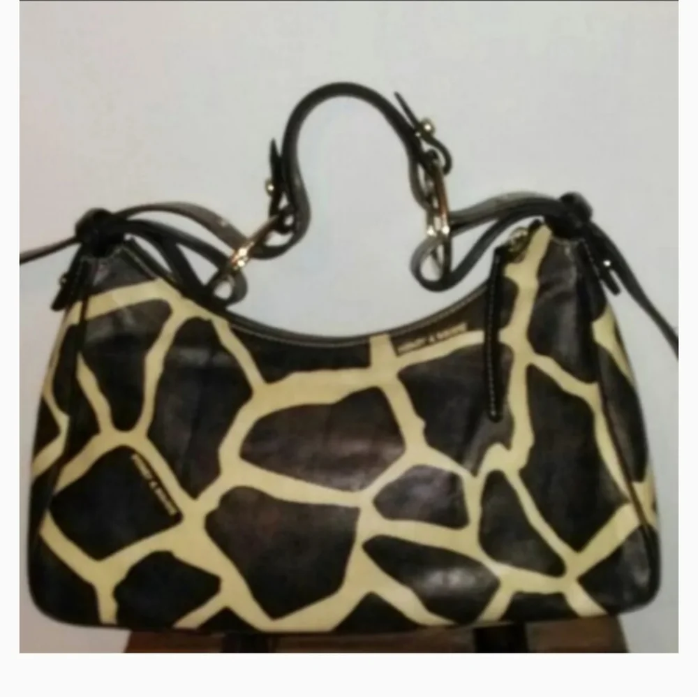 Dooney and Bourke leather giraffe pattern handbag